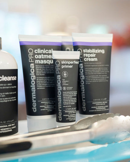 Dermalogica skincare products on a tray with a blurred background