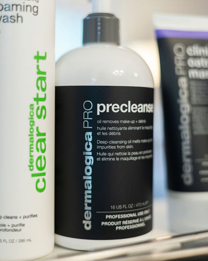 Dermalogica skincare products including 'Clear Start' and 'PreCleanse' on a shelf.